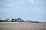 UP 8825 South on KCS grain train